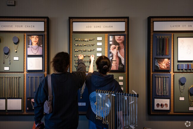 Mother and daughter looking for their perfect accessory at Air & Anchor, Garden City, Cranston.