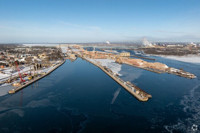 The historic Soo Locks transport massive freighters in Sault Sainte Marie.