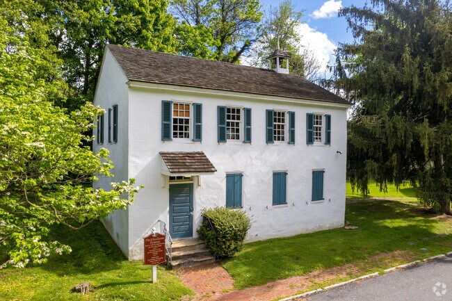 The Schoolhouse Museum alongside the Caleb Pusey House in Upland.