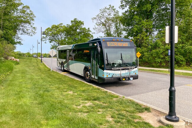 Transportation in Nichols Corner includes the RIPTA bus stopping in East Greenwich Square.