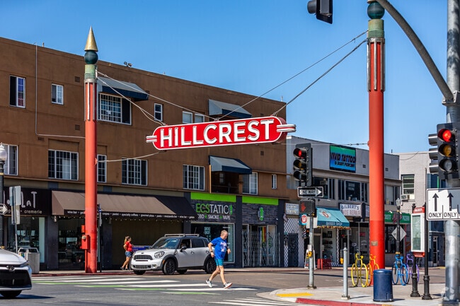 The iconic Hillcrest neighborhood sign welcomes residents and visitors on University Avenue.