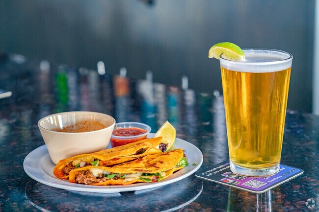 CJ's Pizza Bar and Grill near Whitney Oaks makes the best Quesabirria Tacos.