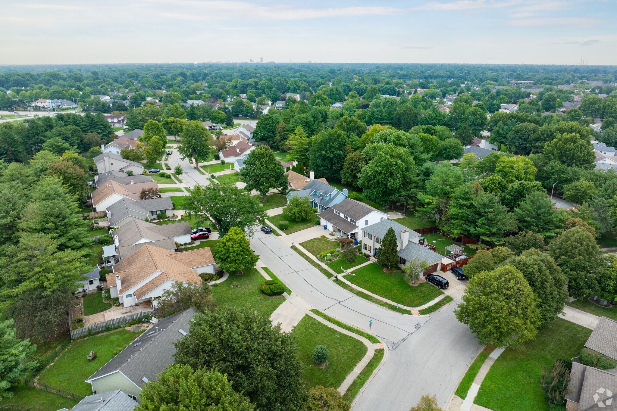 West Koke Mill homes sit on tree lined streets.