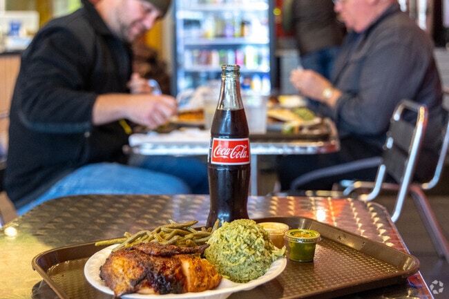 A quarter chicken with sides at Yummy Pollo in Hayfield Dundee.
