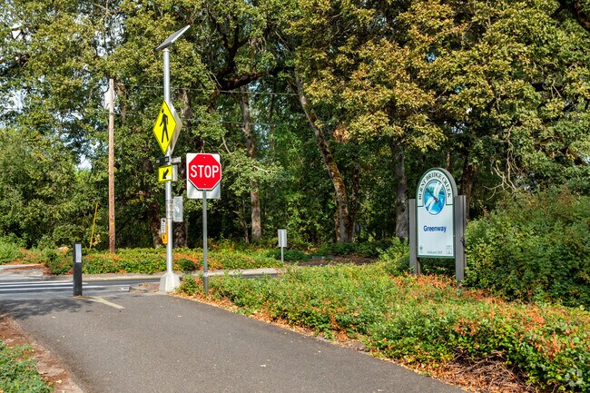 Paved paths in Burnt Bridge Creek Greenway wind through Orchards Area.