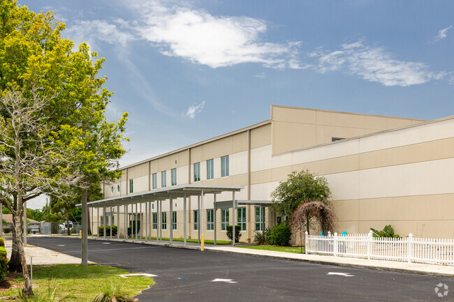 Herbert Cambridge Elementary School in Naples has a designated drop-off area on the side.
