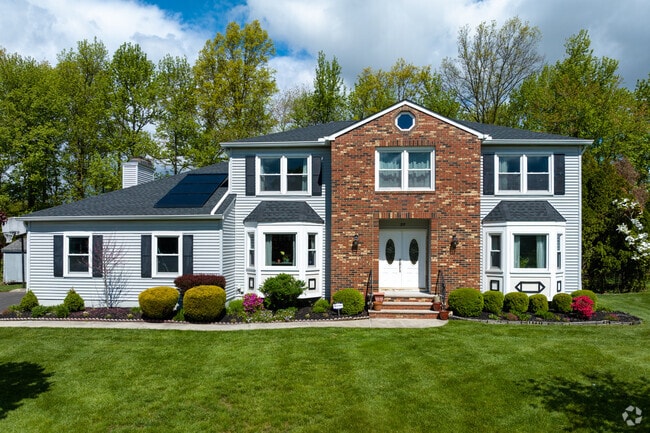 Traditional colonial style homes with large front yards can be found in North Brunswick.