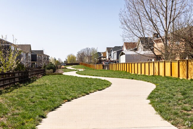 Talk a walk down the winding paved path in Holly Crosssing.