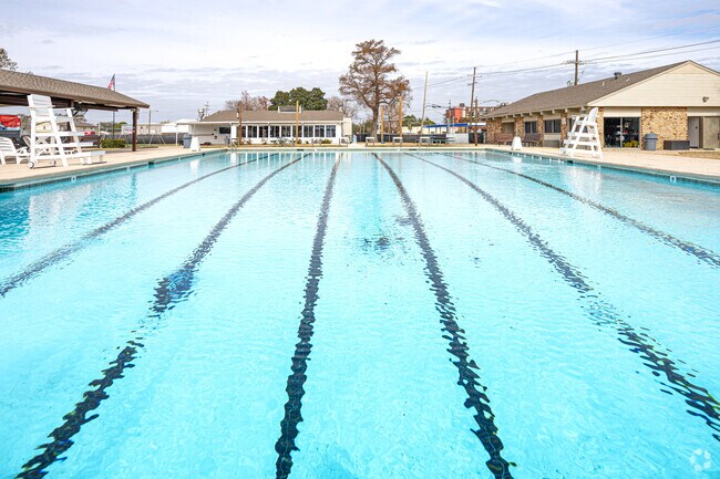 Join a swim team at Green Acres Country Club near Harvard Estates.