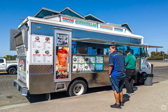 Grab a delicious hot meal from a local taco truck in Kennedy.
