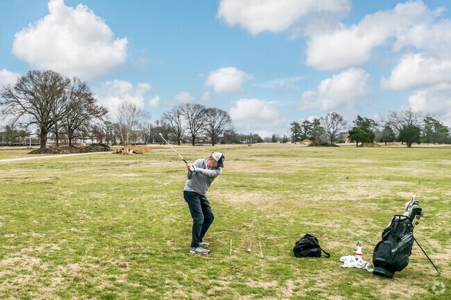 Locals can play a round of golf at Audubon Park.