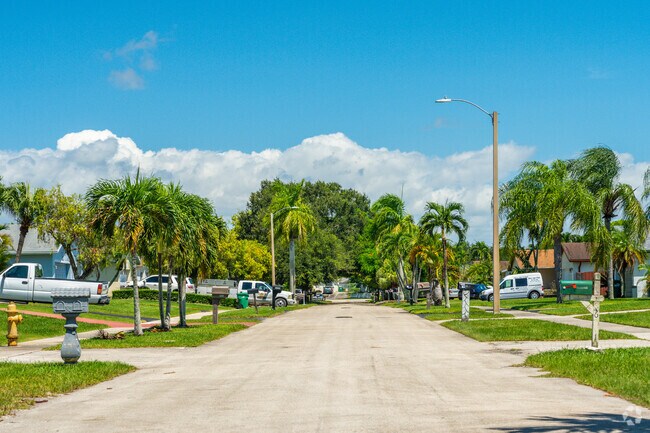Residential streets in South Dade are lines with palm trees and single family homes.