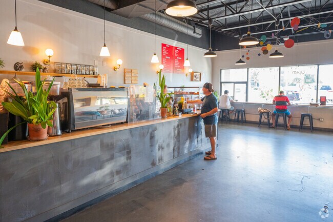 Locals enjoy a cup of coffee and a pastry at the Kookaburra in Butler and Crescent Beach.