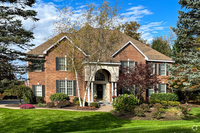 Homes in the Hollis neighborhood are well-maintained and are located on large lots.