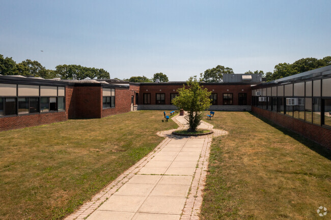 Take a seat or have class outside on the Manetuck Elementary School courtyard.
