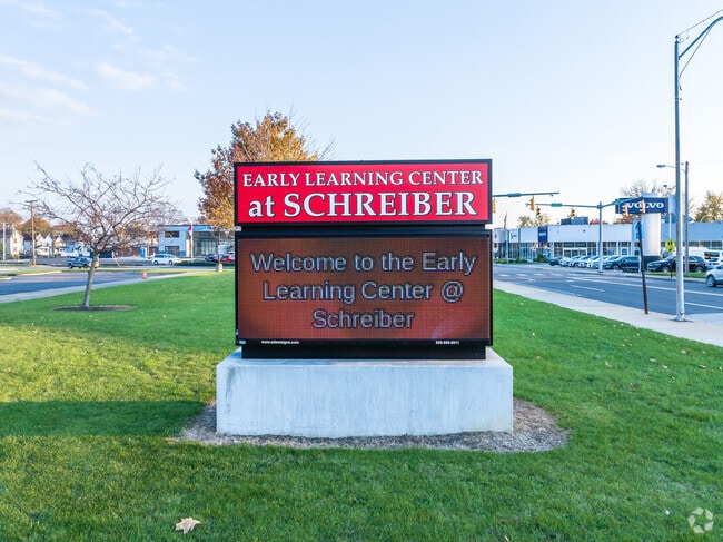 There is a digital message board built into the sign at 
Barbara F Schreiber Elementary.