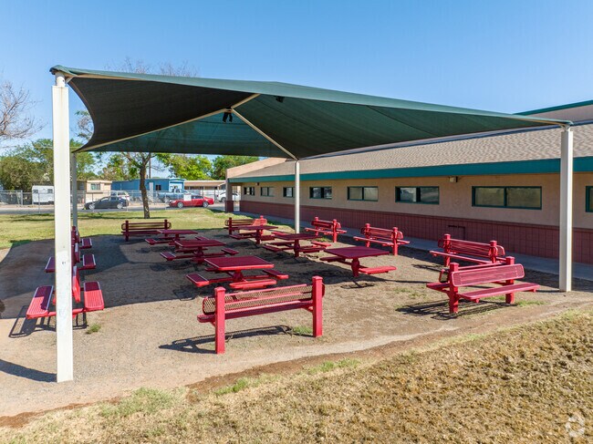 Students can eat their lunch in the courtyard at Moya Elementary School.