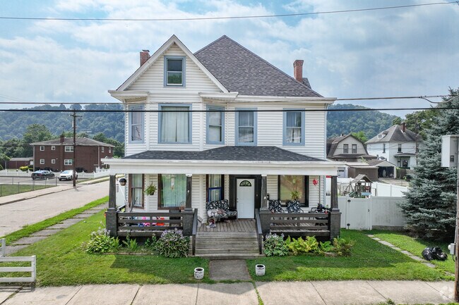 A beautiful Victorian home in Tarentum with a covered porch. Perfect for sunny days.