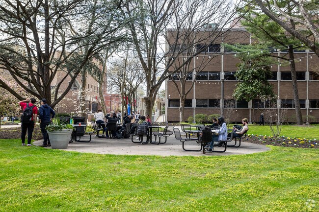 Enjoying the nice day in a courtyard at Rutgers University in Camden.