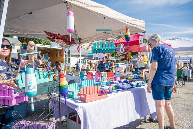 Gorgeous pastels and hand-crafted wooden décor are among the items for sale at the Conimicut-Shawomet artisan market.