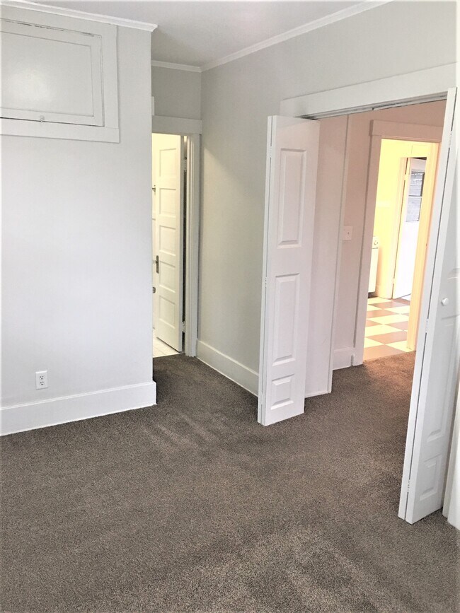 bedroom into bath and living room