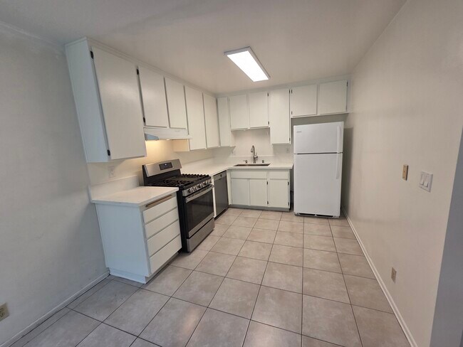 quartz counters, stainless sink