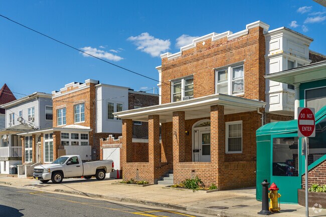 Duck Town features large classic Four Square homes with small attached driveways.