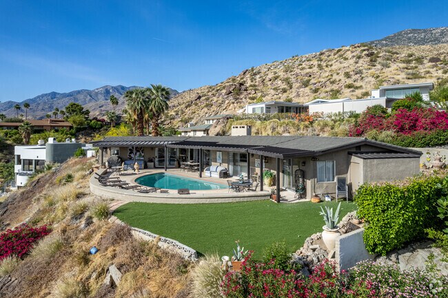 Some hilltop homes offer swimming pools overlooking the Palm Springs neighborhood.