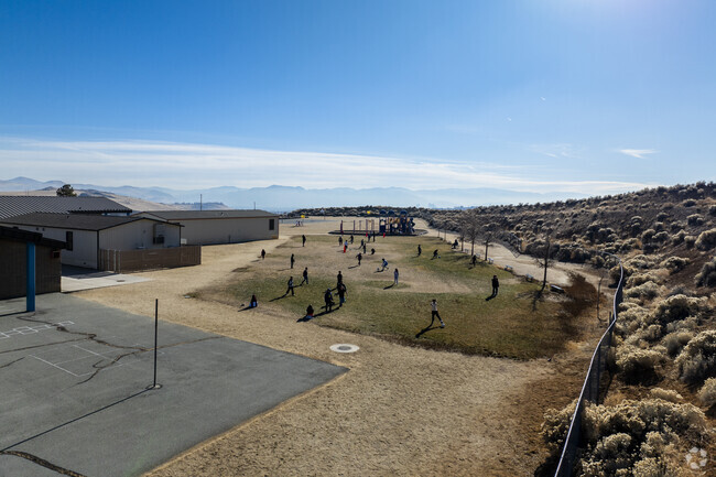 Students playing outside at Lois Allen Elementary School.