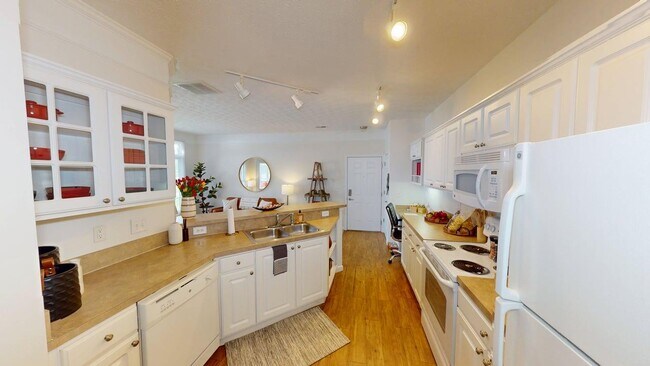 Cook, clean, and relax with a fully equipped kitchen and a full-sized washer and dryer—everything you need, right at home.