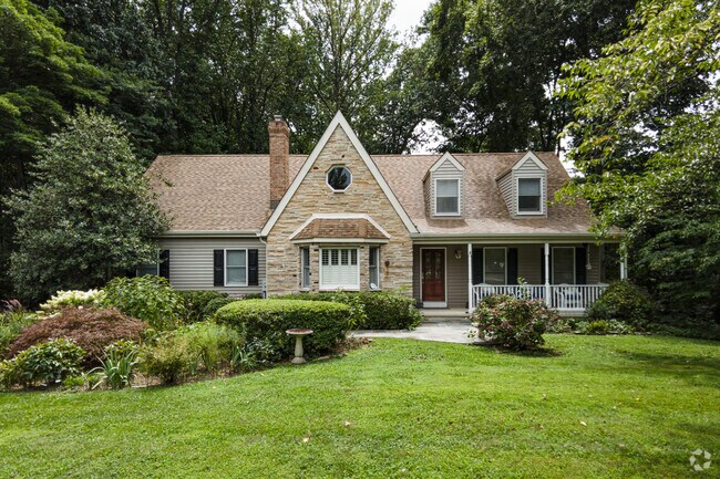 This Crownsville home features small Tudor-style elements.