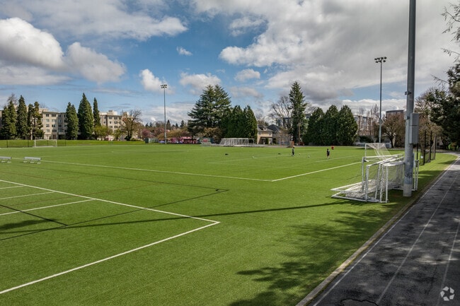 Soccer Players Warming Up on the Turf at Buchman Field in the Kerns Neighborhood.