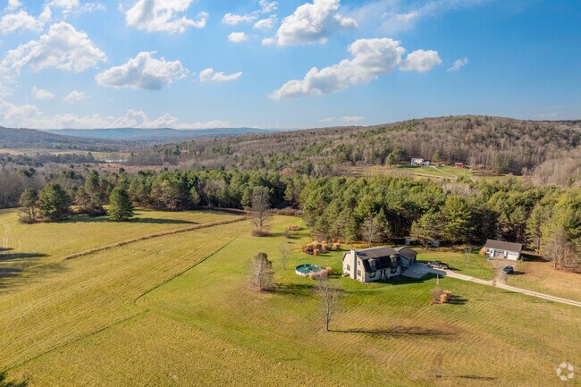 Large acres with cozy homes can be found in the outskirts of Erin.