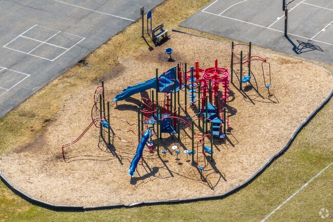 Furnace Woods Elementary School has athletic fields and a playground.