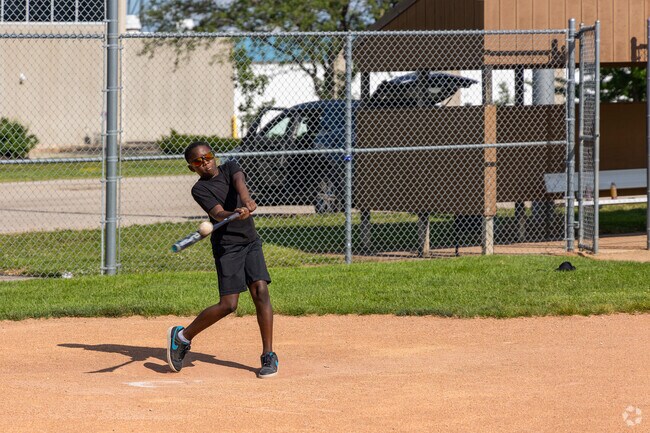Common Grounds baseball players practice at the Joe Staub Memorial Field.