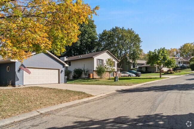 Fall brings vibrant colors to the peaceful residential roads of Apple Hill.