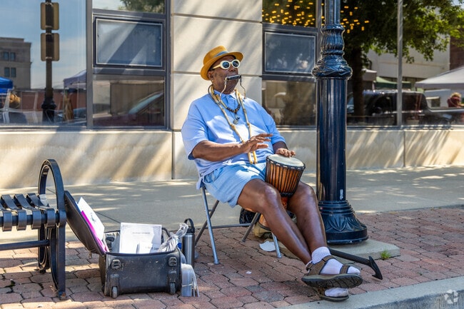 Live music fills the air at the Old Capitol Farmers Market in Downtown Springfield each weekend.