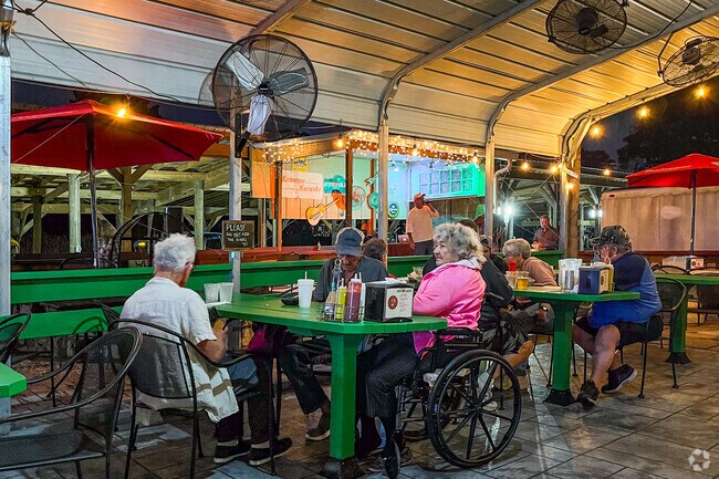 Locals enjoy food and drinks at Gator Bay Marina Bar and Grill in Lisbon.