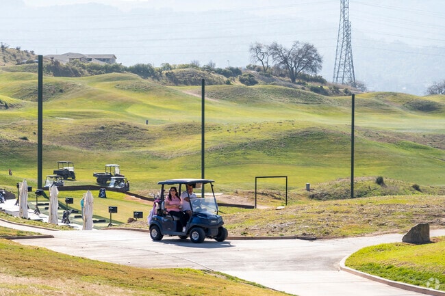 Residents enjoy pristine greens and world-class amenities at Boulder Ridge Golf Club in Almaden Hills Estates.