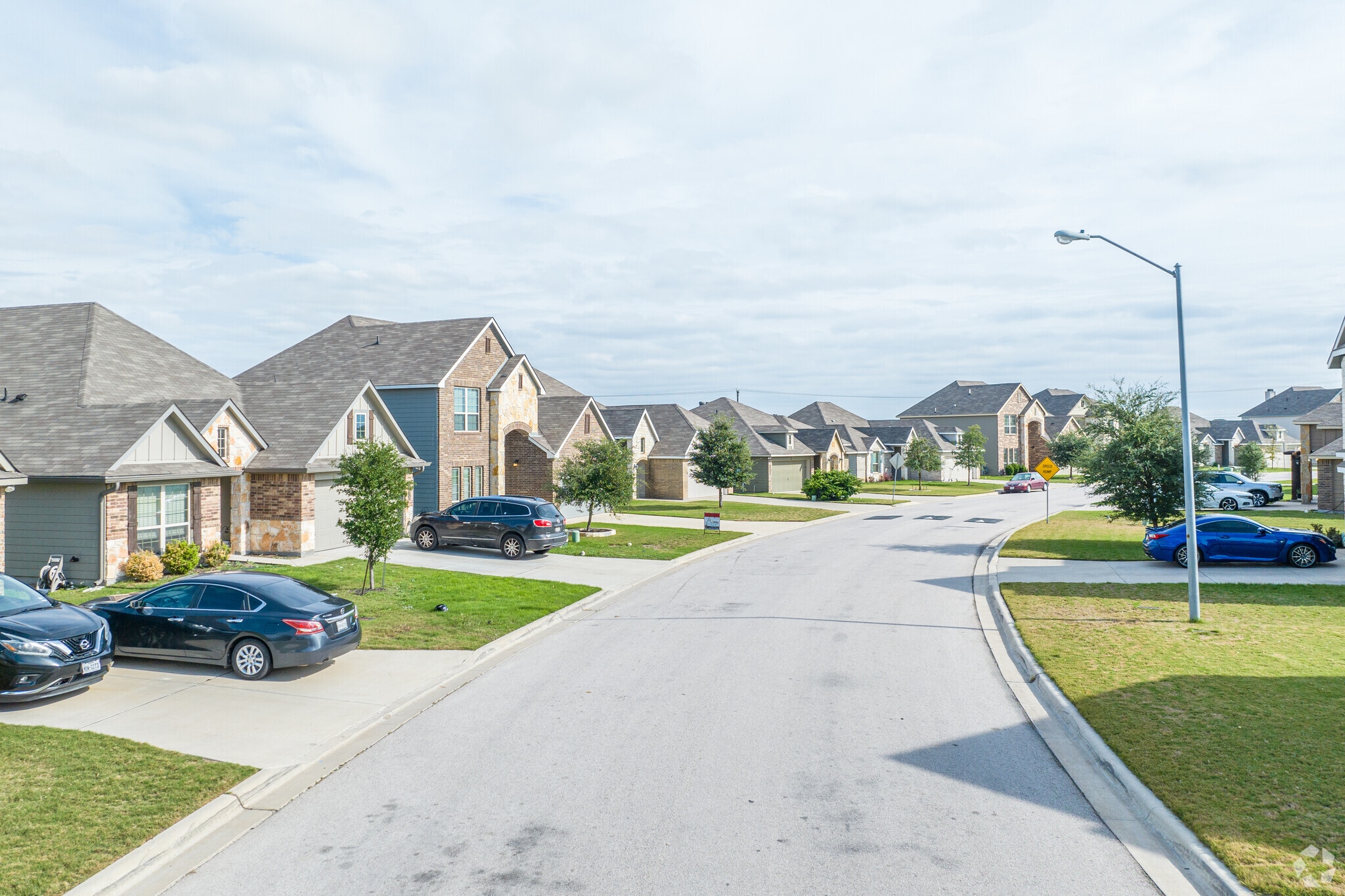 West Temple's charming homes boast timeless brick and stone facades.
