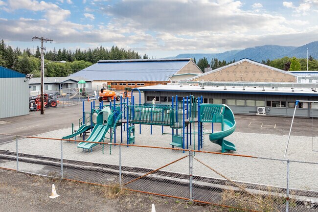 Young students can play outside on the school playground at Lake Quinault Elementary School.