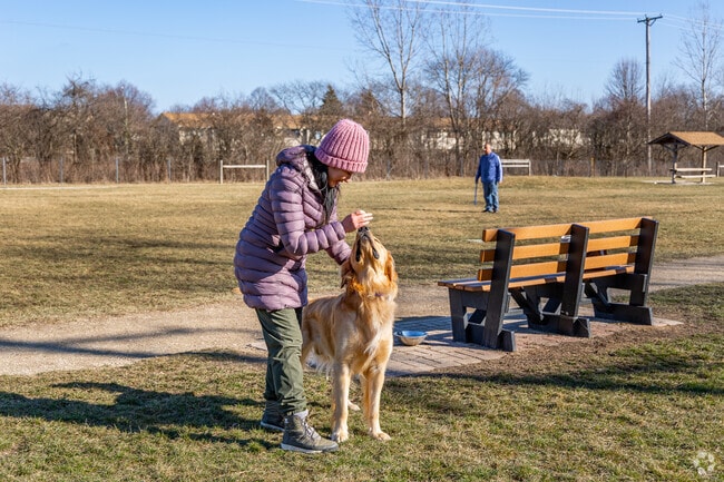 Horatio Gardens residents can train their pets at Happy Tails Dog Park.