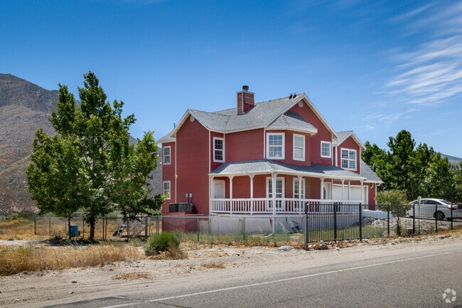 Home painted in a red exterior seen in the Cabazon area.