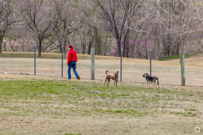Take your dogs to the Meridian Dog Park near Sherwood Glen.