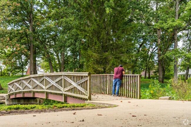 A Neighborhood Empowerment resident observes wildlife at a local park.