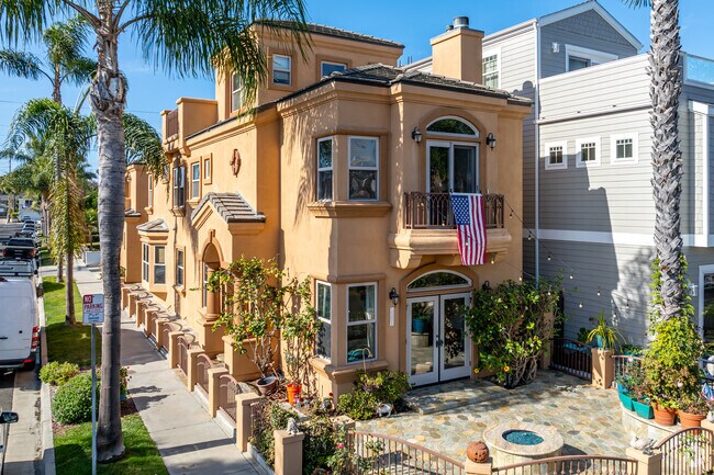 A three-story modern home sits on a corner lot in Yorktown.