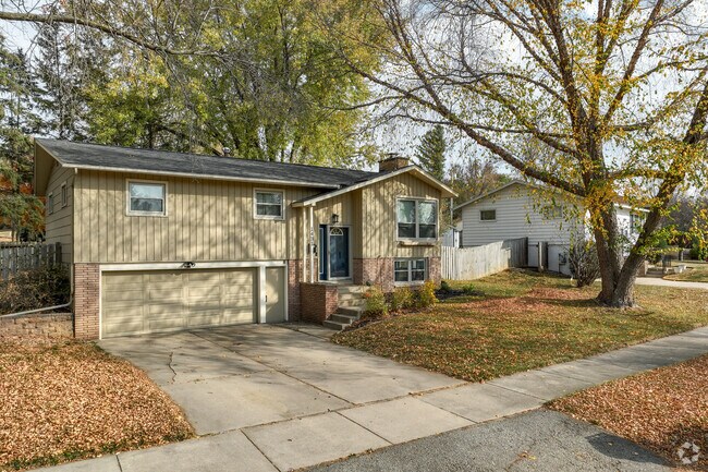 Spacious lawns and mature trees are common features of homes in the John Adams neighborhood.