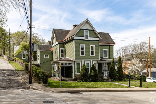 Classic homes line the streets of the Carnegie neighborhood up and down the hills.