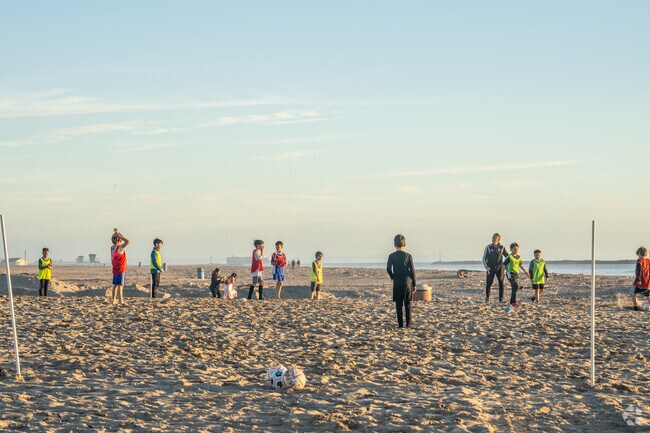 Locals enjoy playing soccer at one of Oxnard's many beaches.