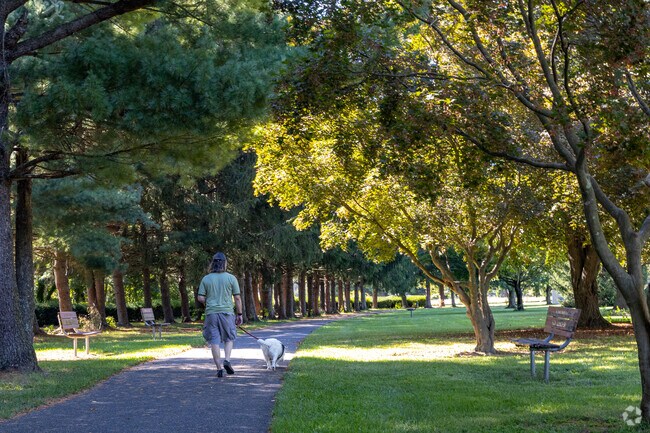 Walk the dog around the paved paths of Marlton Park.